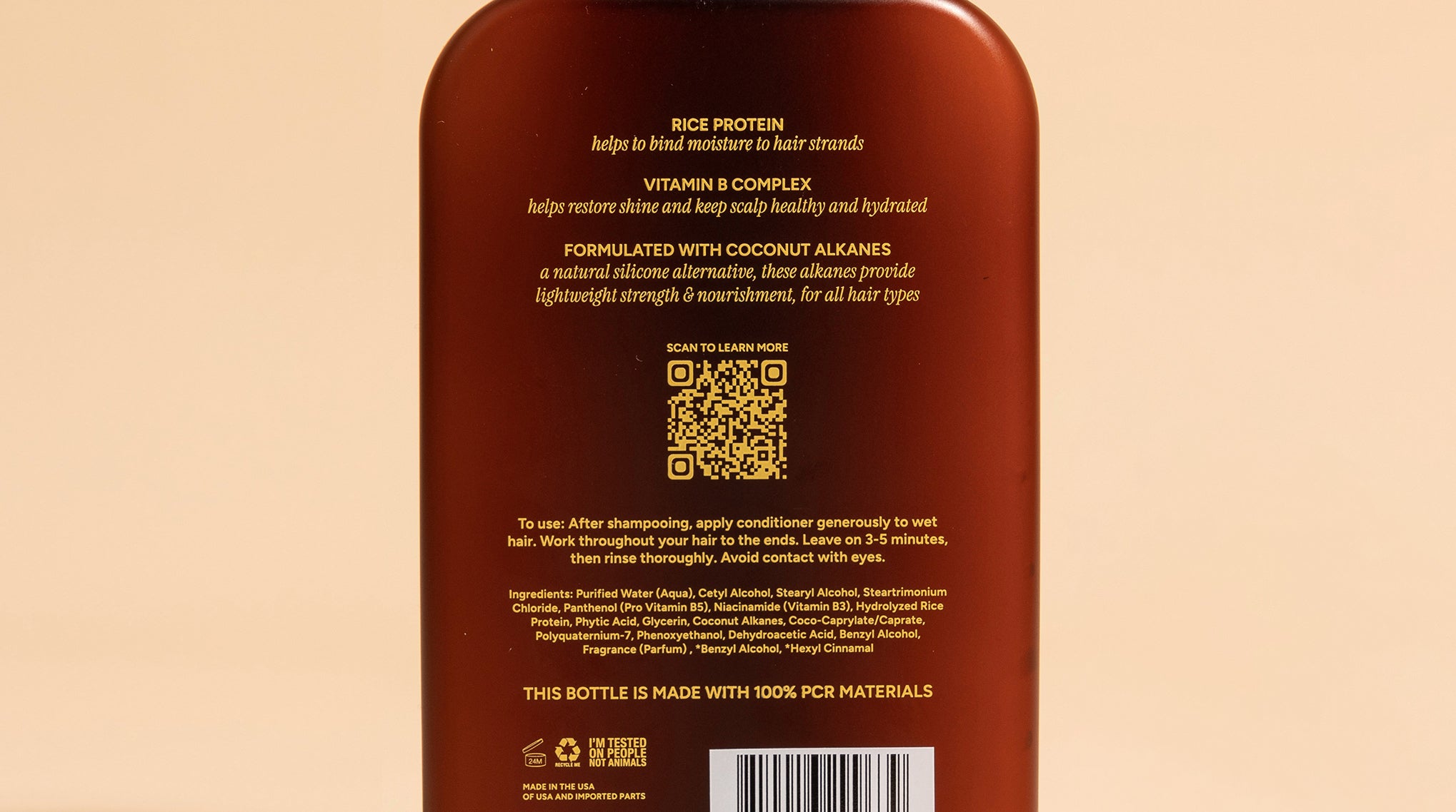 photo of back of a conditioner bottle showing all the copy of the product