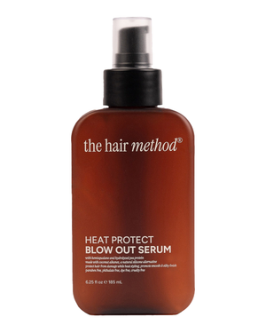 brown cosmetic bottle with black pump on a white background. 