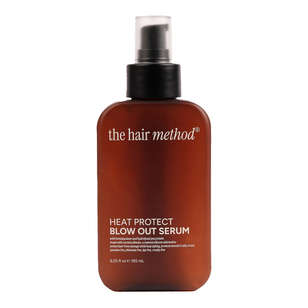 Brown bottle of 'the hair method' heat protect blowout serum on a white background