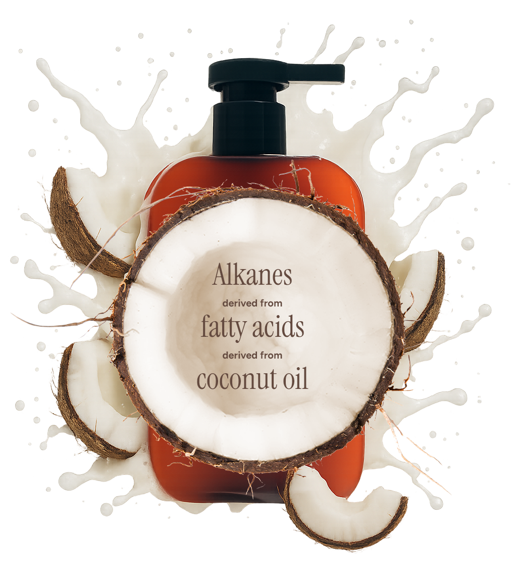 Coconut oil bottle with a split coconut and text about fatty acids on a white background