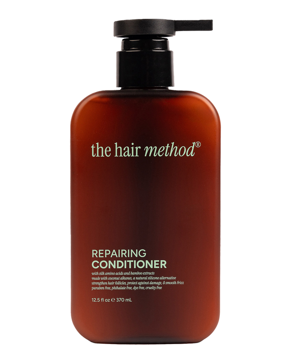 brown cosmetic bottle with black pump on a white background. 
